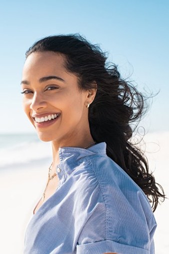 Lady smiles on beach